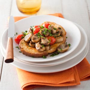 Toast with tomatoes and mushrooms