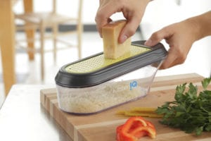 Cheese grater with container